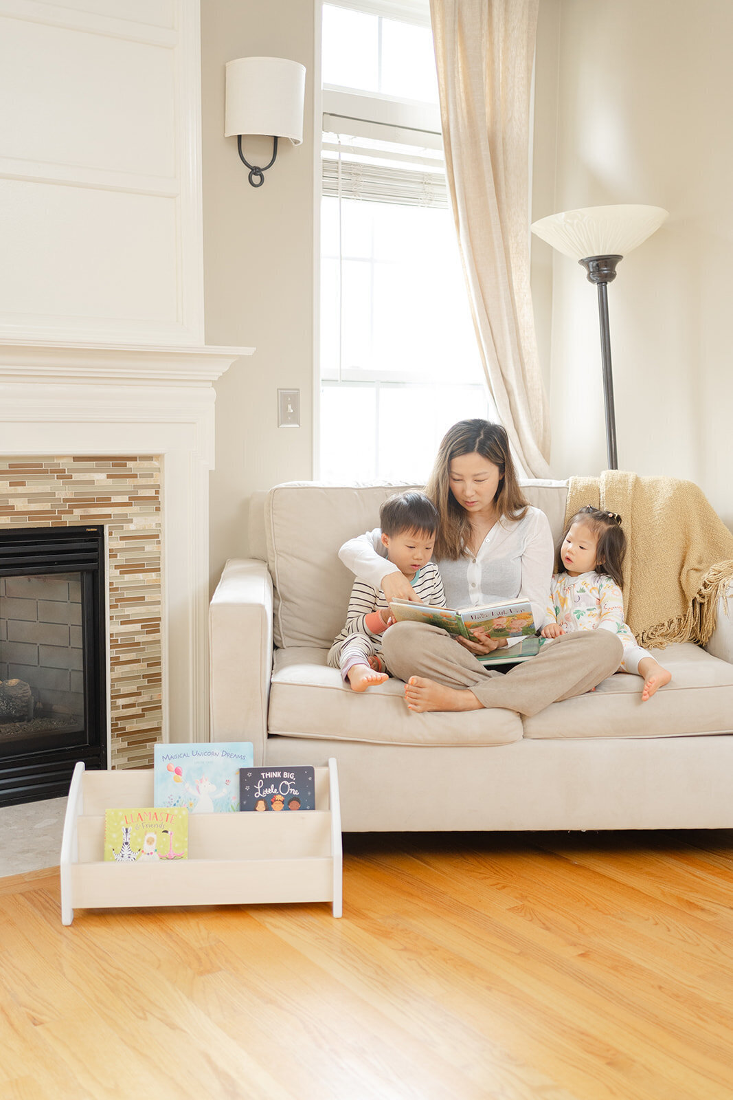 mom reading books during product photography in Leesburg,Virginia