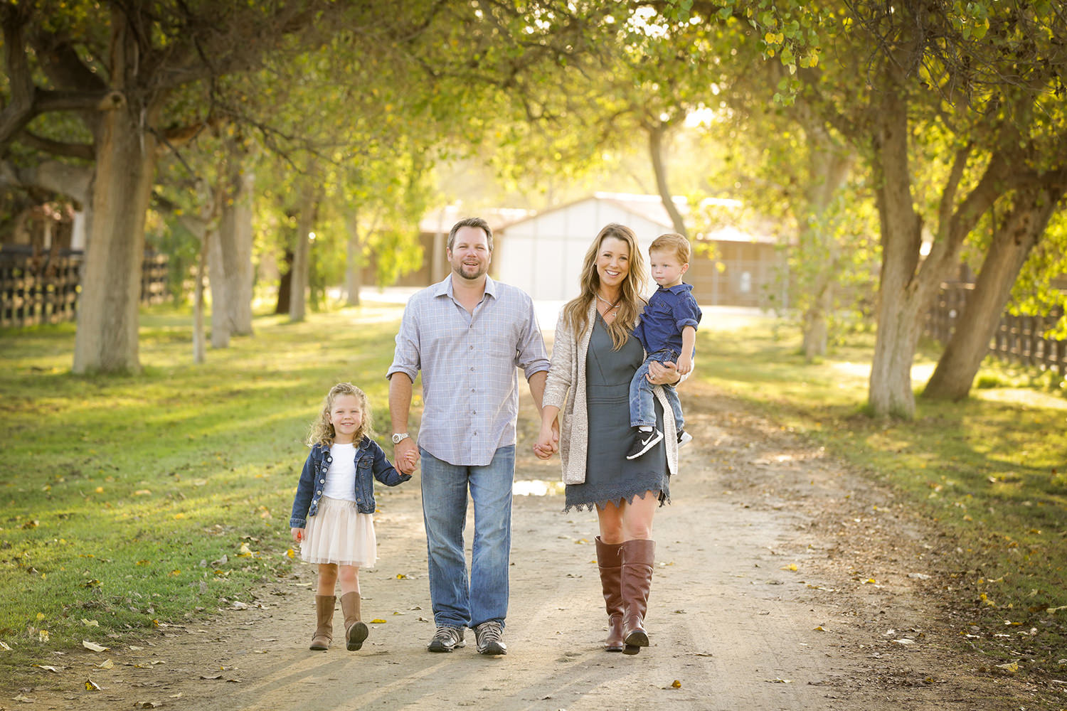 san diego family photography | family walking and holding hands all smiles
