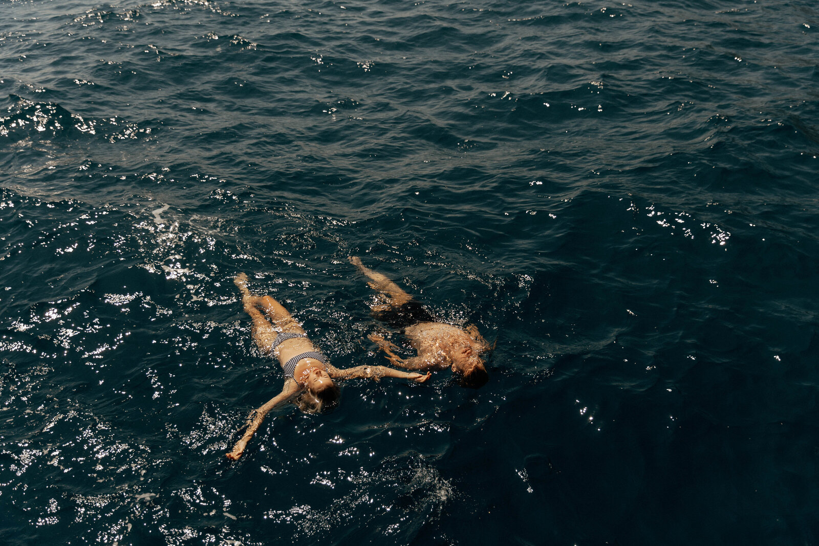 An elopement photographer capturing a couple after getting married in Italy.