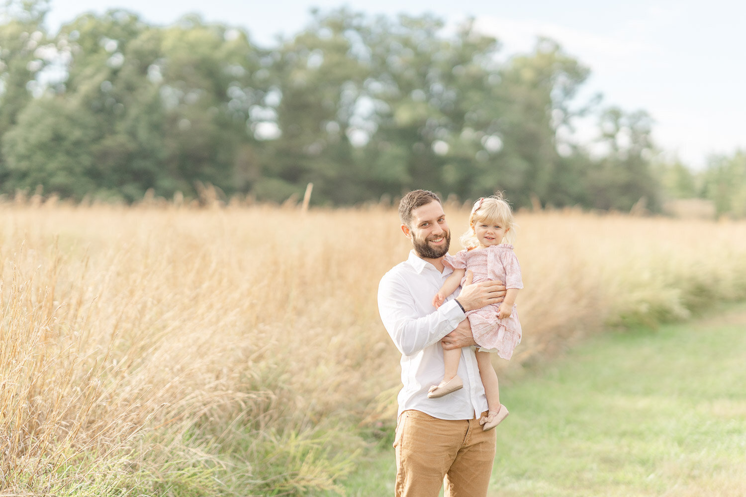 dad and daughter smiling during Ashburn, VA mini session