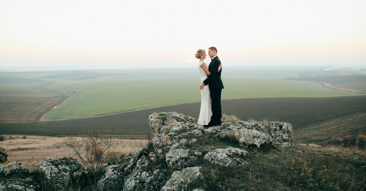 Adventure Elopement Wedding - Jennifer Mummert Photography - Embracing on the Rocks