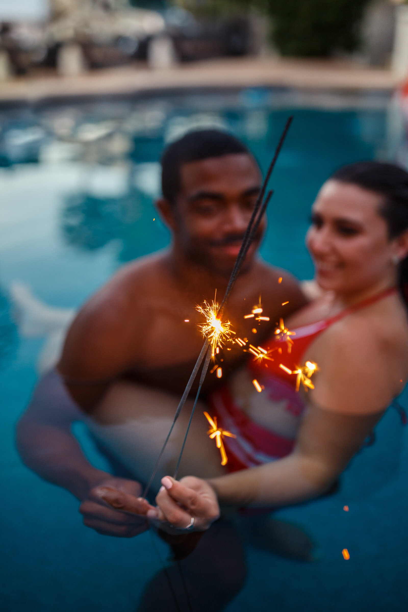red white and blue pool session with sparklers