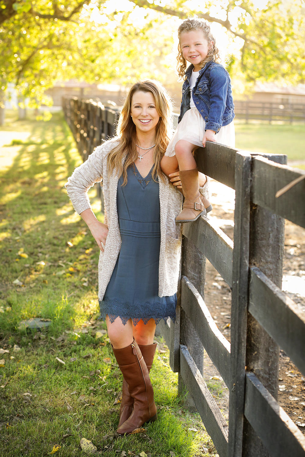 san diego family photography | family in a field with leafs and fall colors outdoors smiling