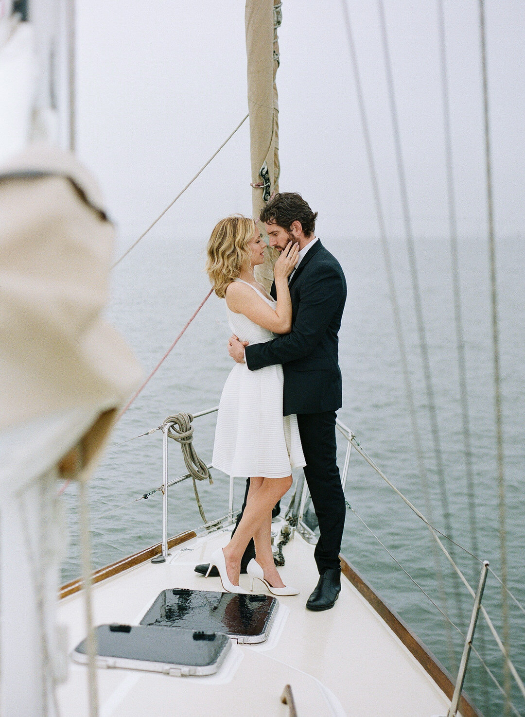 Couple Nose to Nose on Sailboat in Charleston