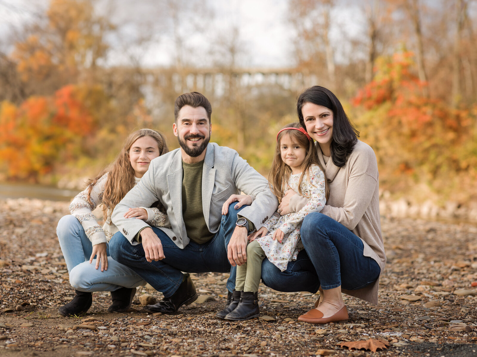 family sitting for fall family portraits at cuyahoga valley park