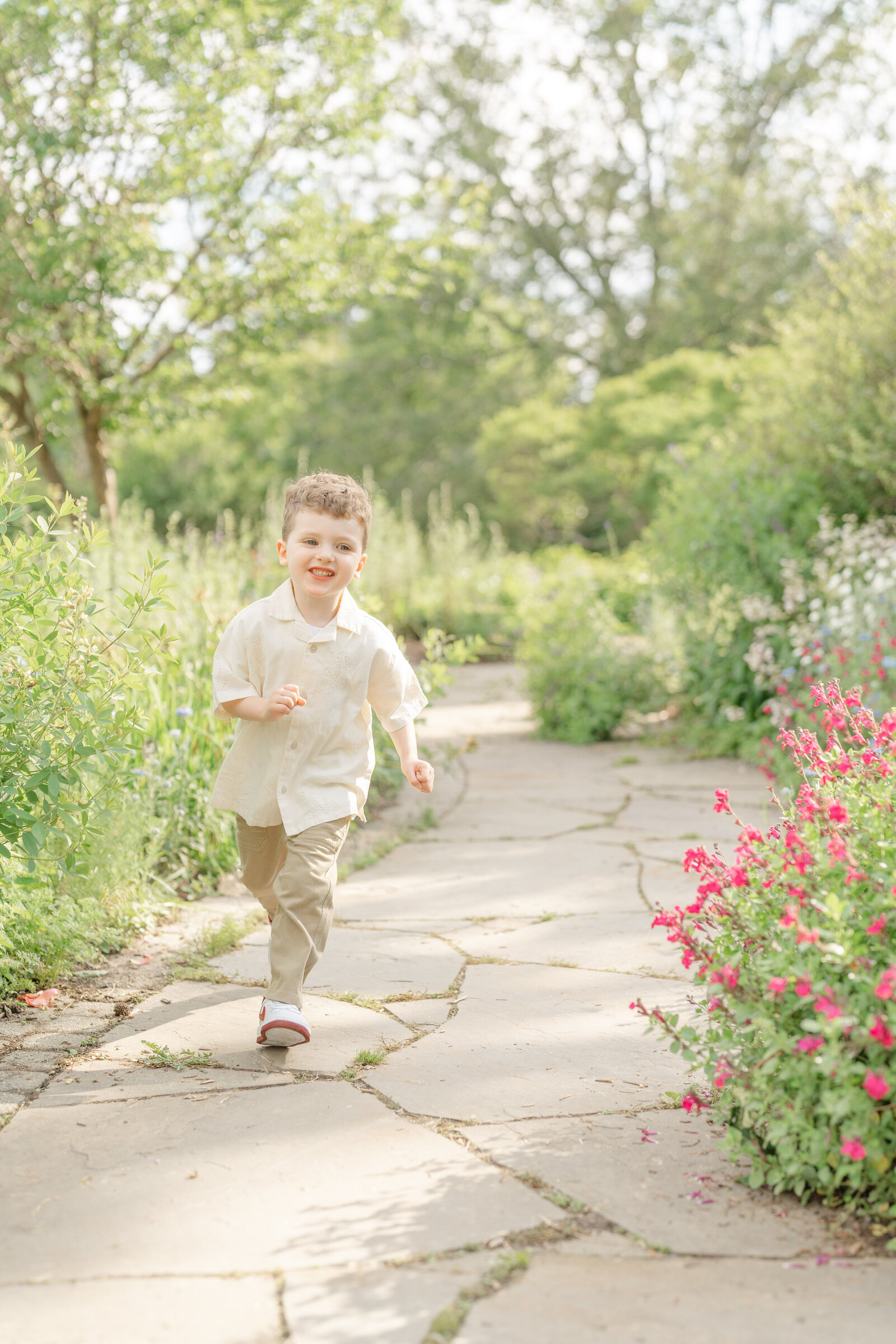 boy running at a garden in Fairfax County,VA