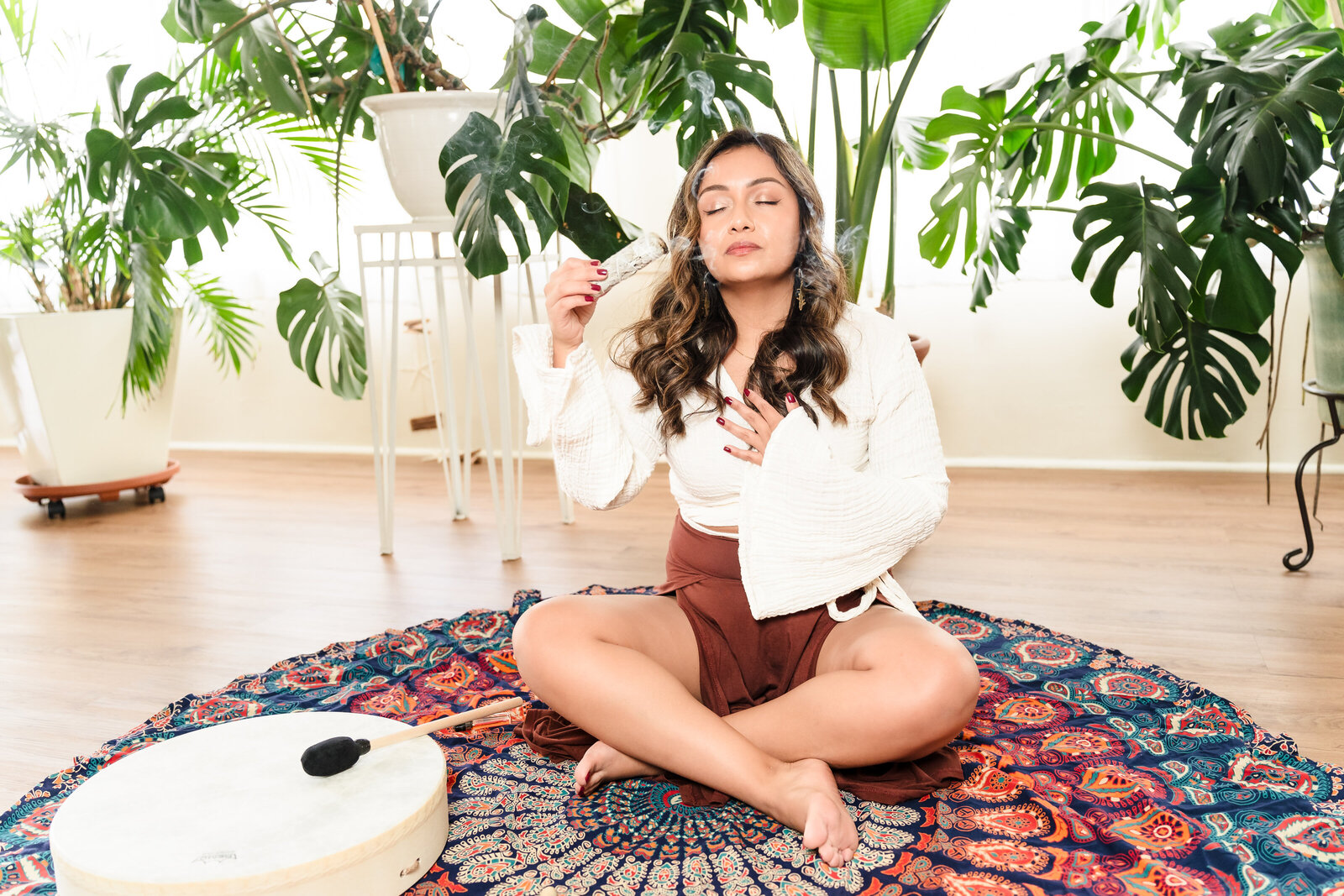 life coach burns palo santo