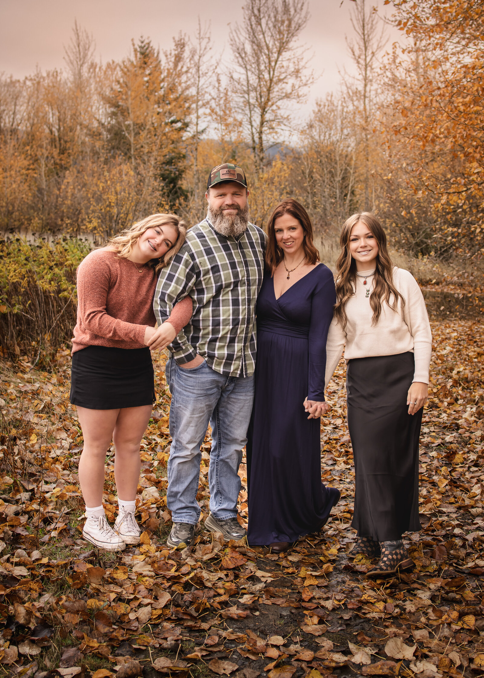 Family of four with older teenager children in the columbia river gorge