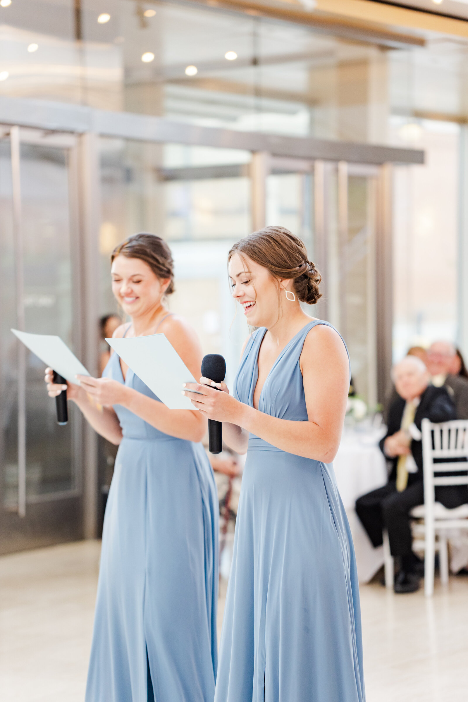 29_bridesmaids_giving_speech_in_blue_bridesmaid_dresses