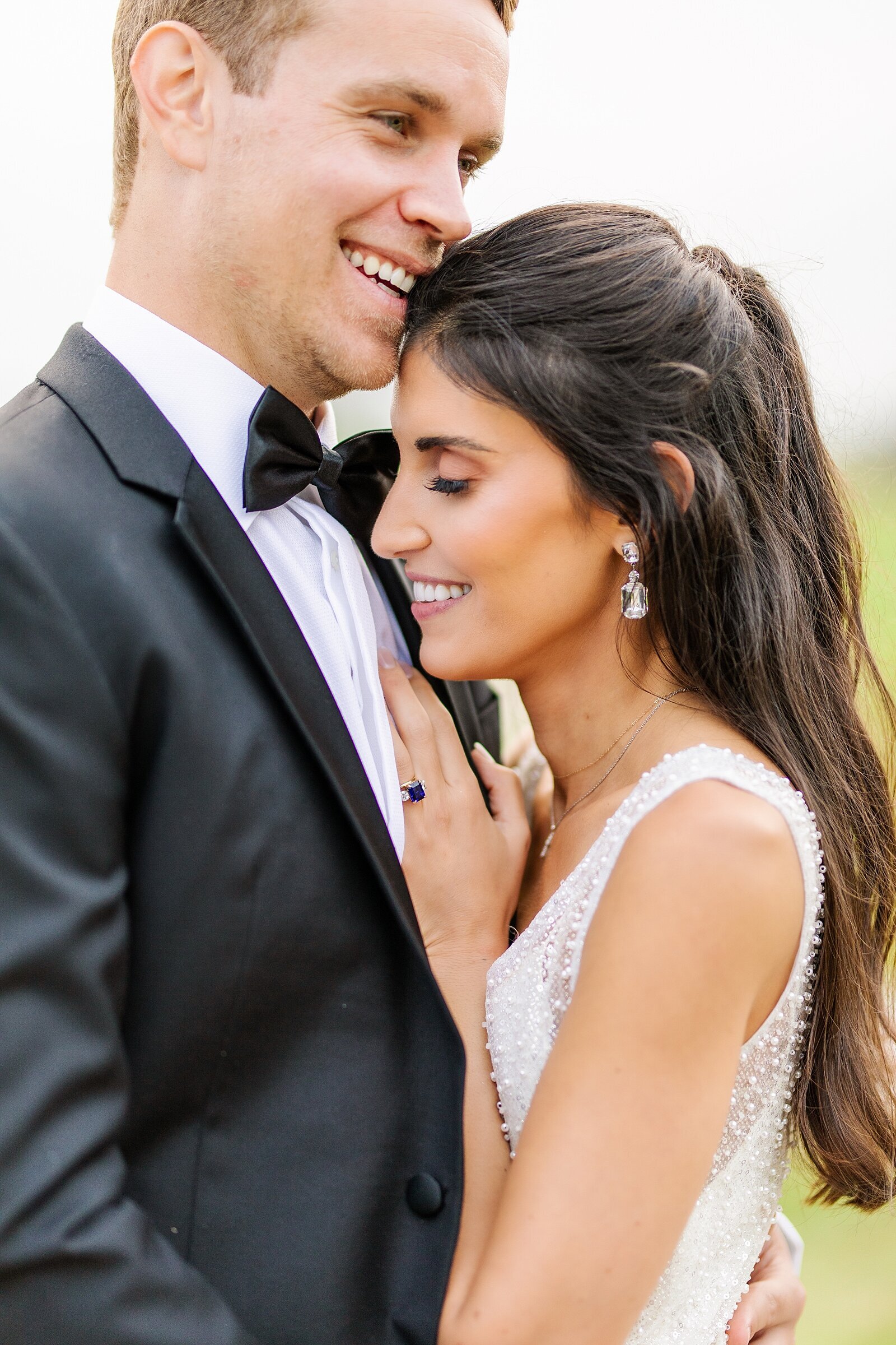 Bride and groom portraits on the golf course of The Lodge at Torrey Pines wedding venue in La Jolla, California.