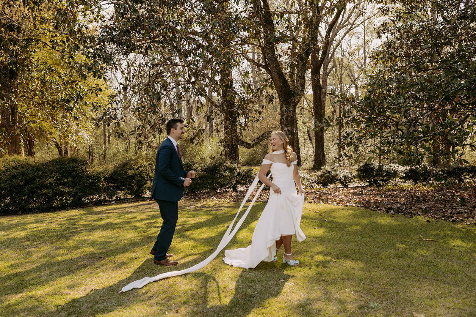 Groom and Bride playing tag on their wedding day