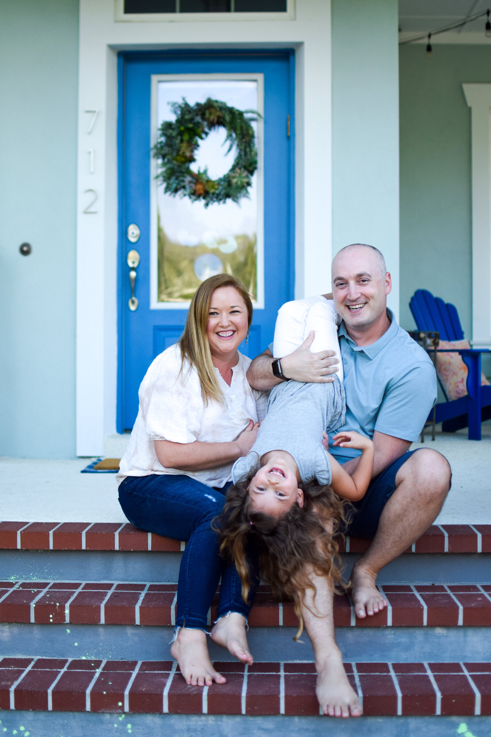 Family steps blue door Front Porch Project Oakland Florida