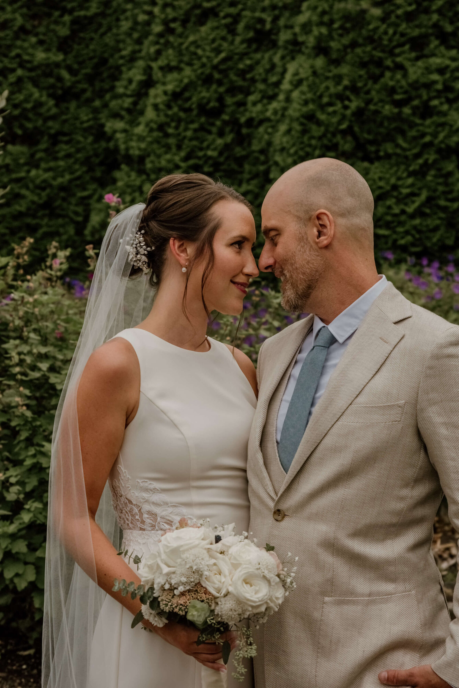 Bride and Groom nose to nose.