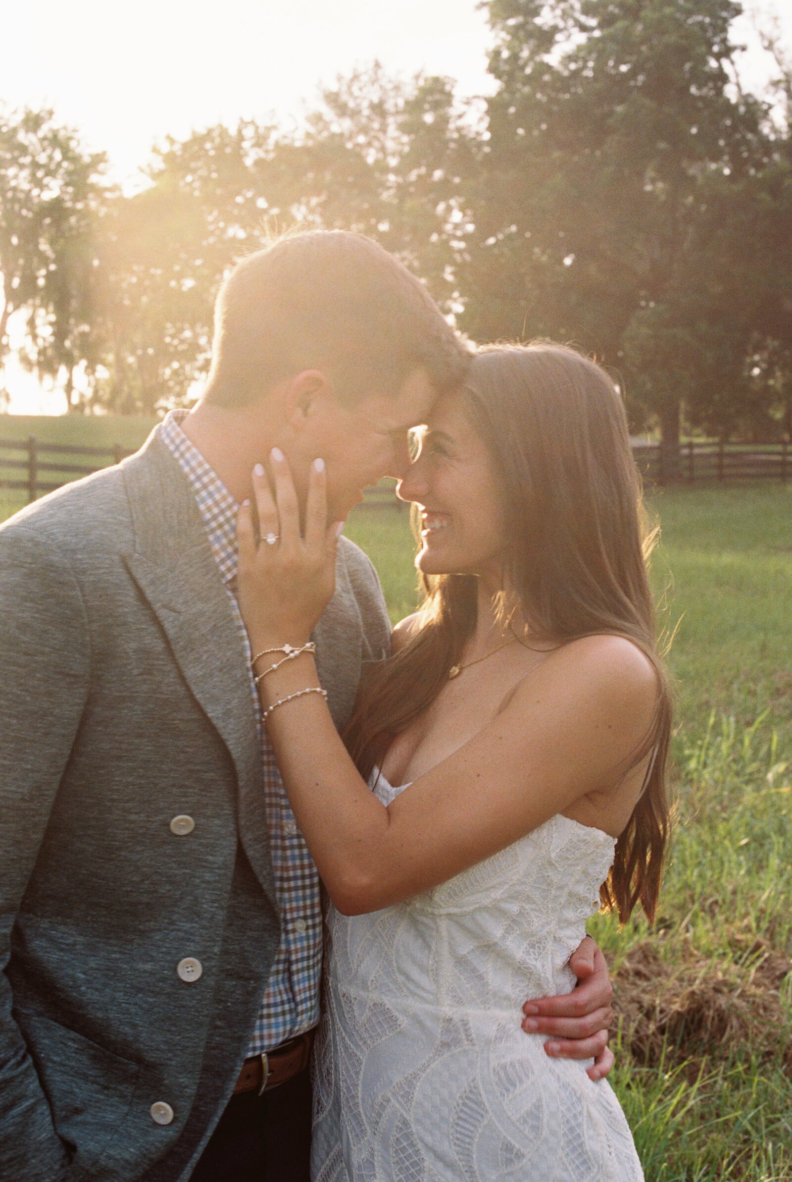 Natural light engagement photographer Alabama outdoor romantic session candid.