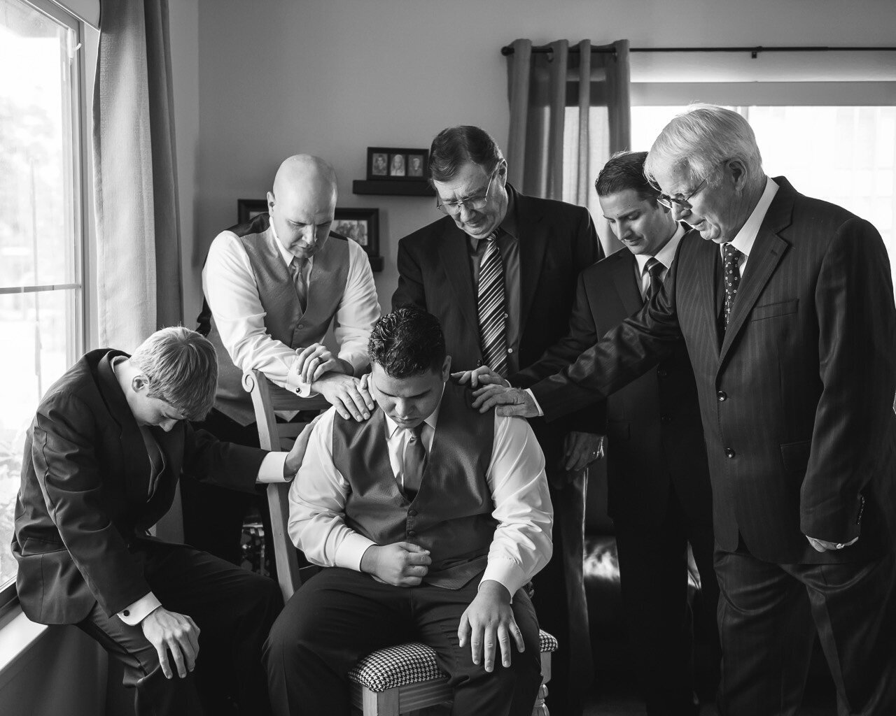 An emotional moment captured during a wedding celebration in San Antonio, featuring candid, documentary-style photography by CMH Studios