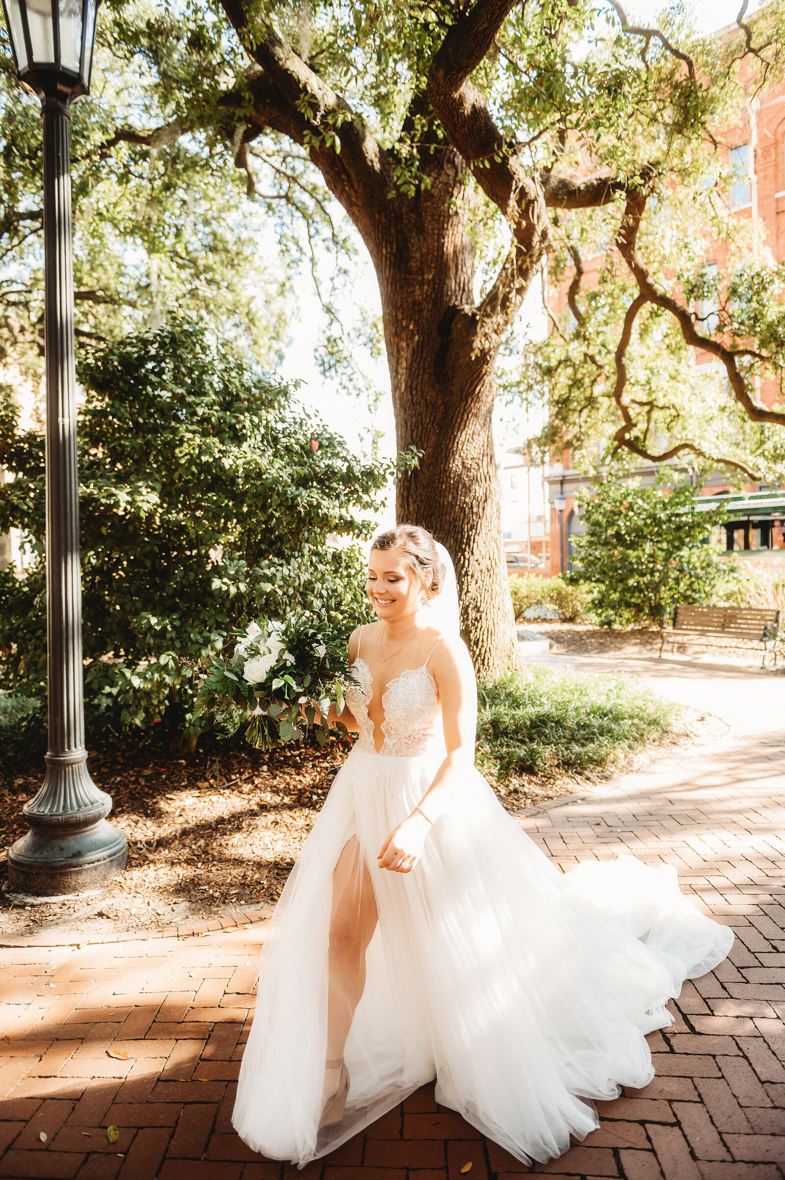 Bride walks to first look with her groom in Savannah, Ga.