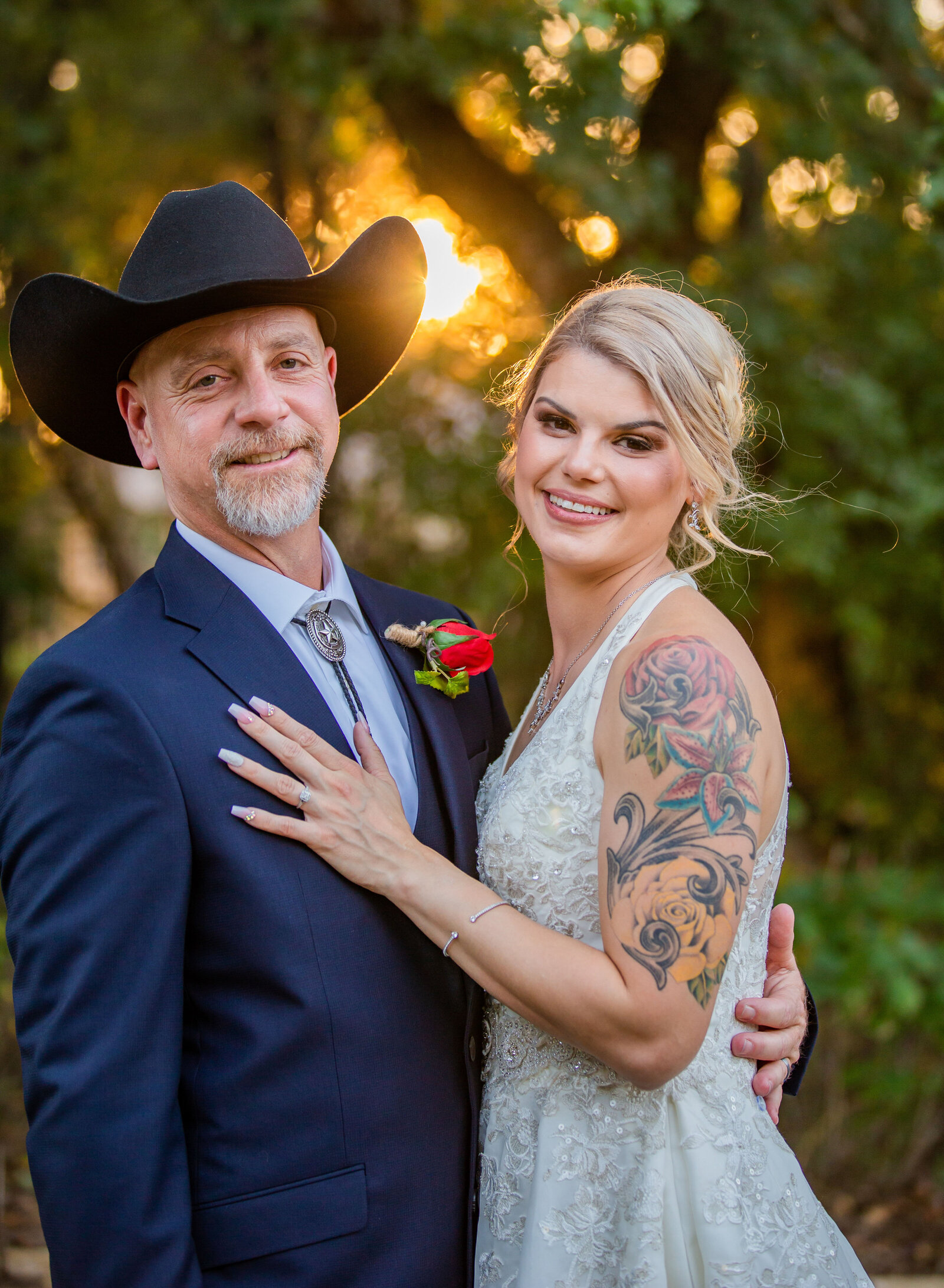 bride and groom in sunset