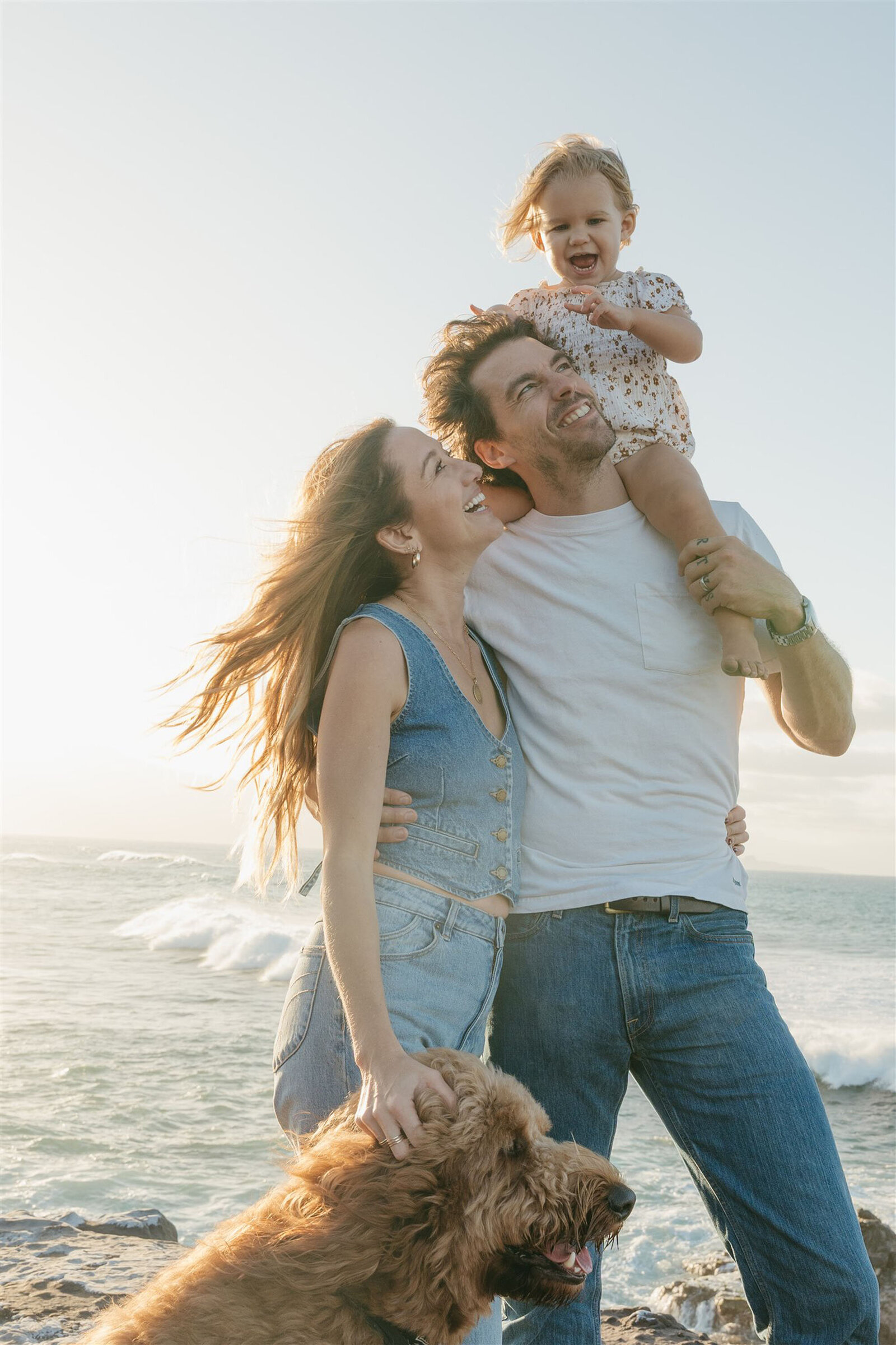 Love on Maui during a family photography session, natural laughter and candid joy.