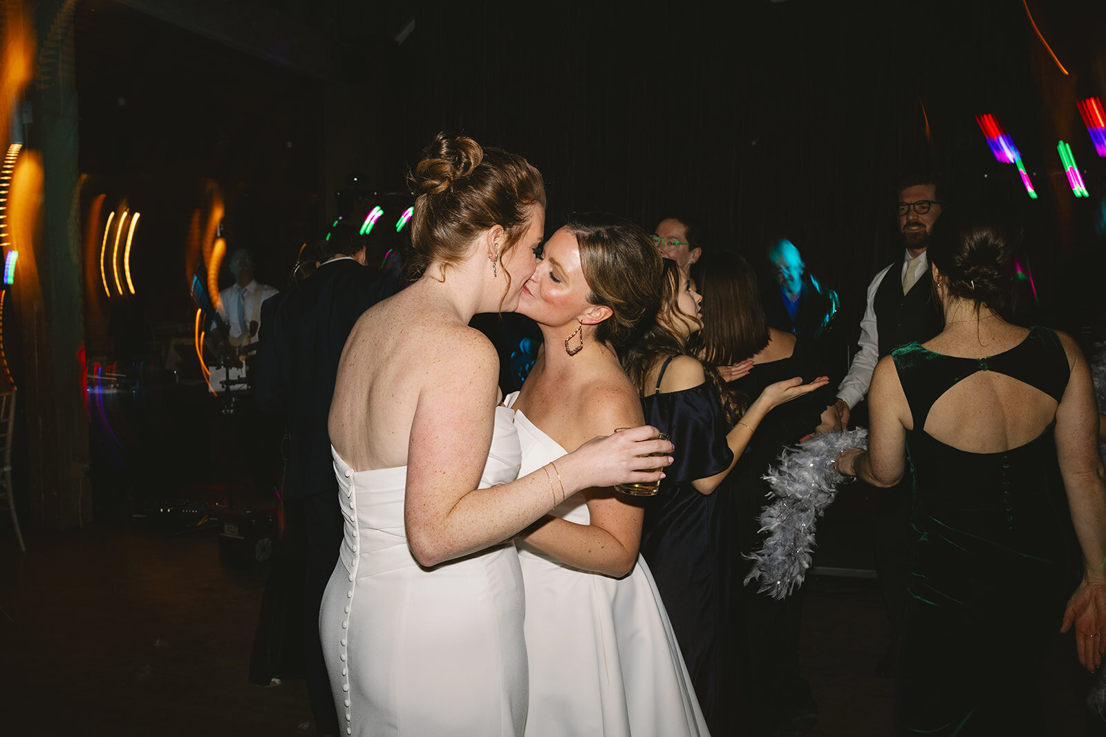 brides-kissing-new-years-wedding