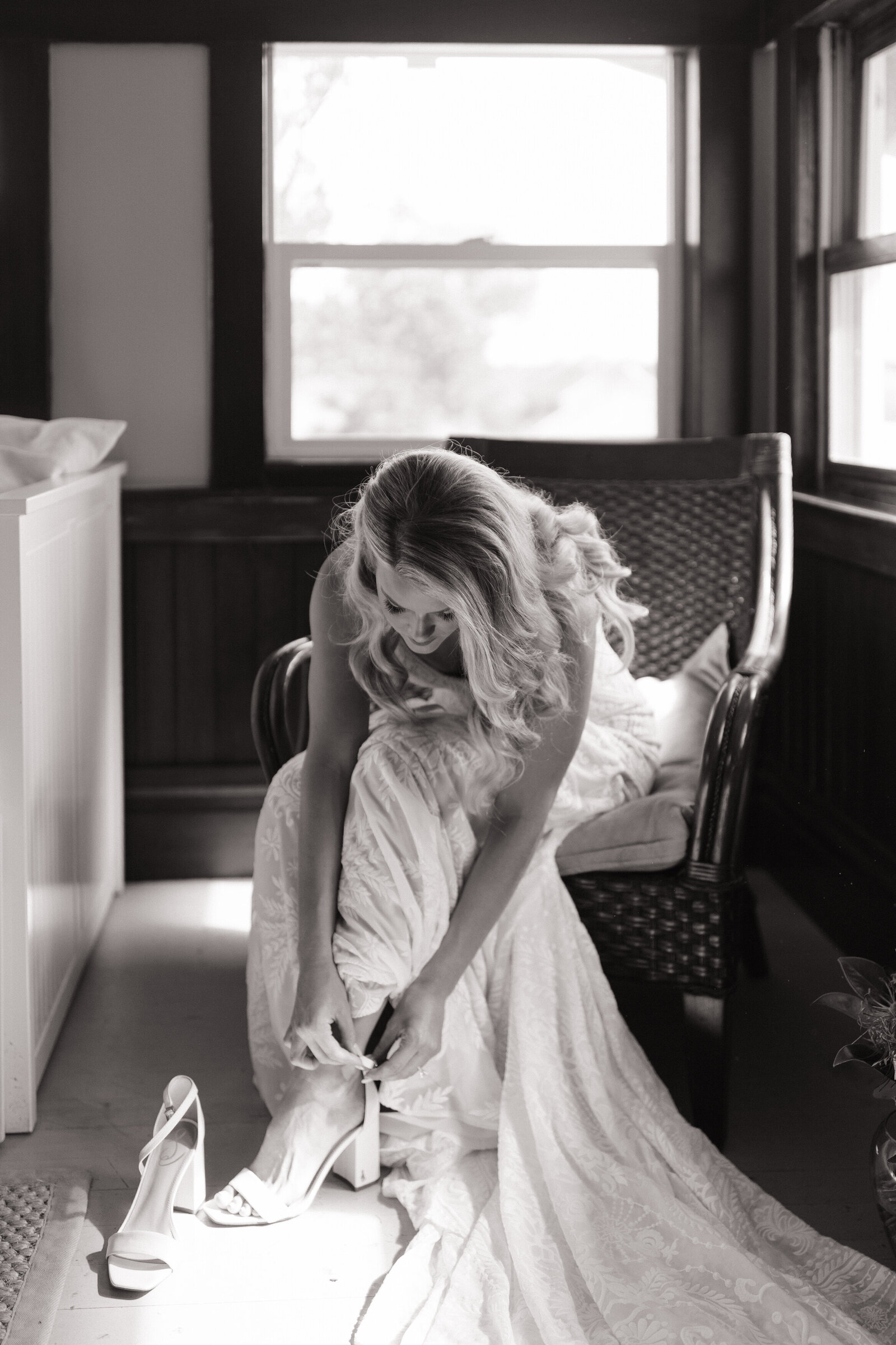 Bride putting on heels in Sun Valley, Idaho