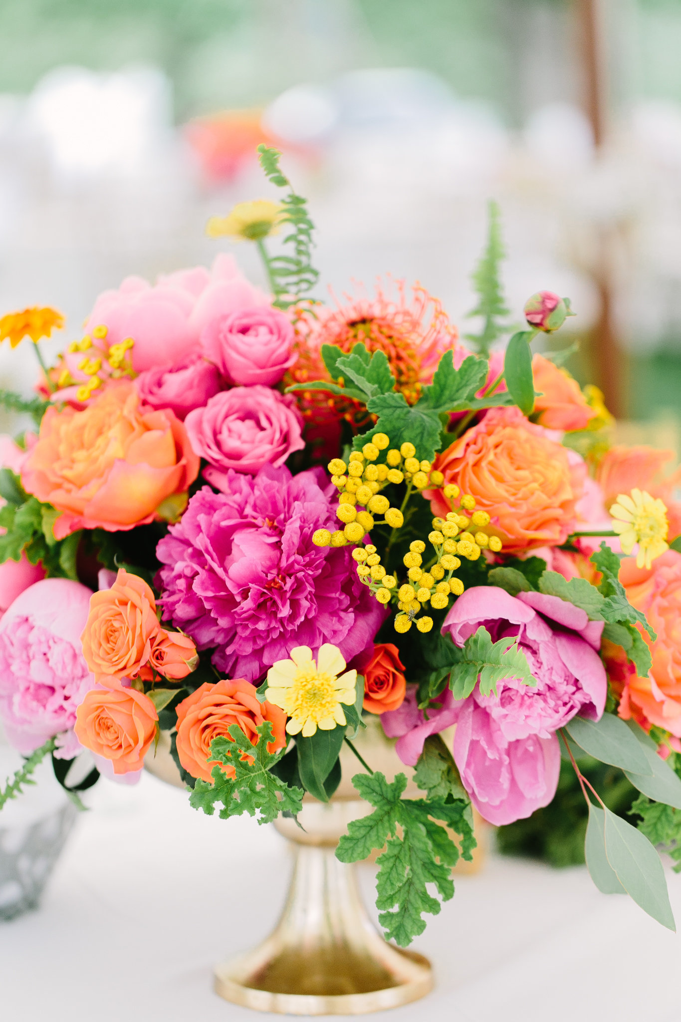 vibrant flower summer  center piece with peonies and roses
