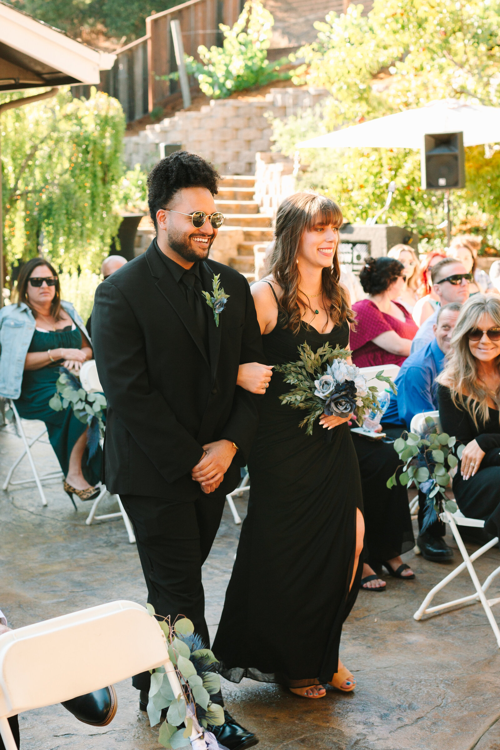 The bridal party in a colorful backyard wedding.