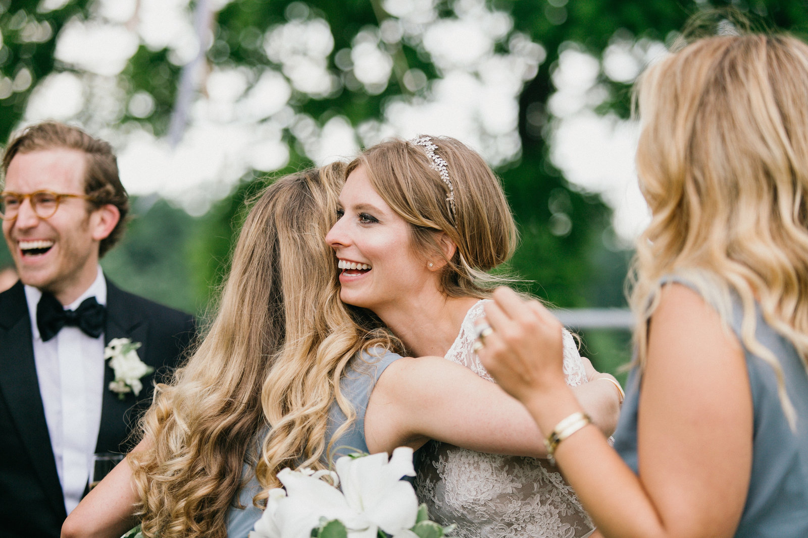 Bride shares an embrace with her sister after the ceremony.
