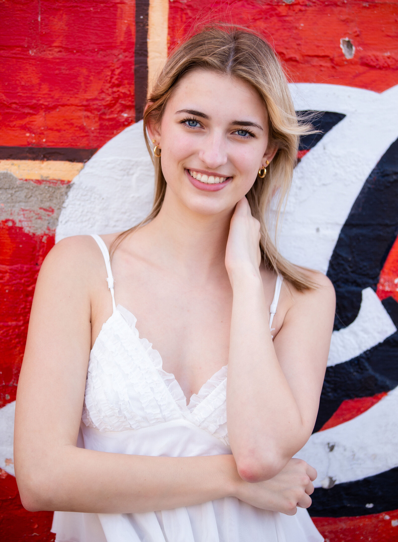 senior girl with mural