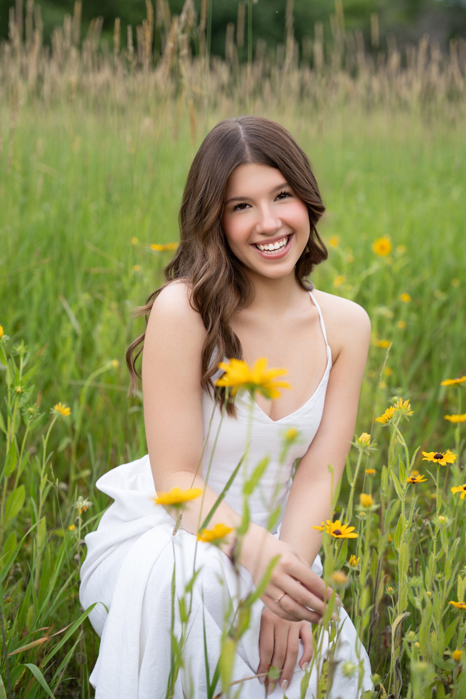 senior-girl-in-white-dress-with-flowers