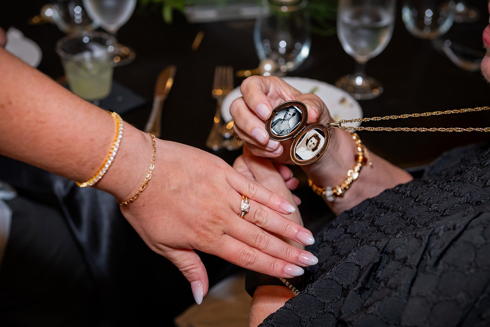 An emotional moment as the bride holds a locket with a cherished photo, symbolizing a personal connection on her wedding day, captured by CMH Studios during a luxury San Antonio wedding