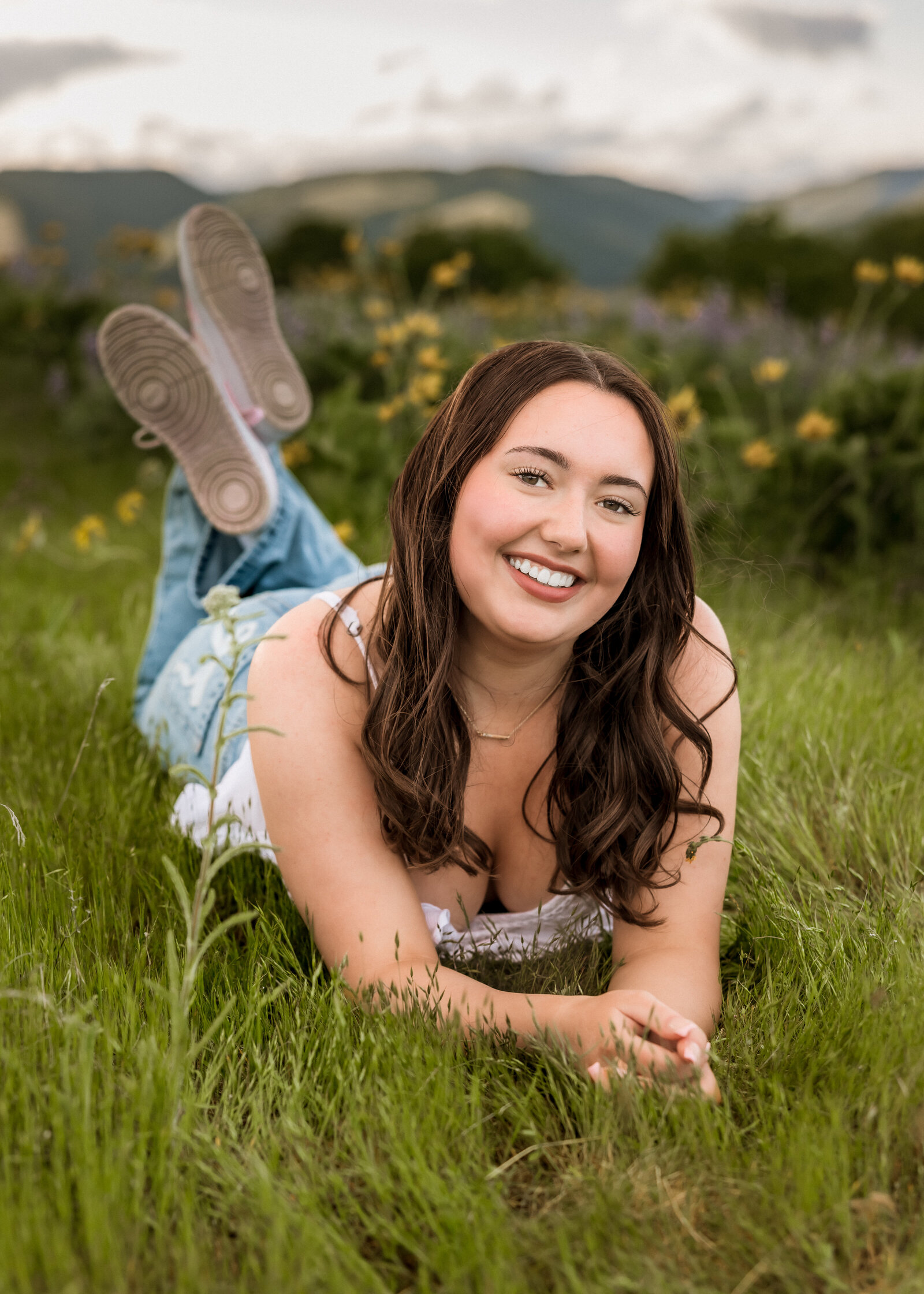 Girl with wildflowers at Tom McCall Viewpoint