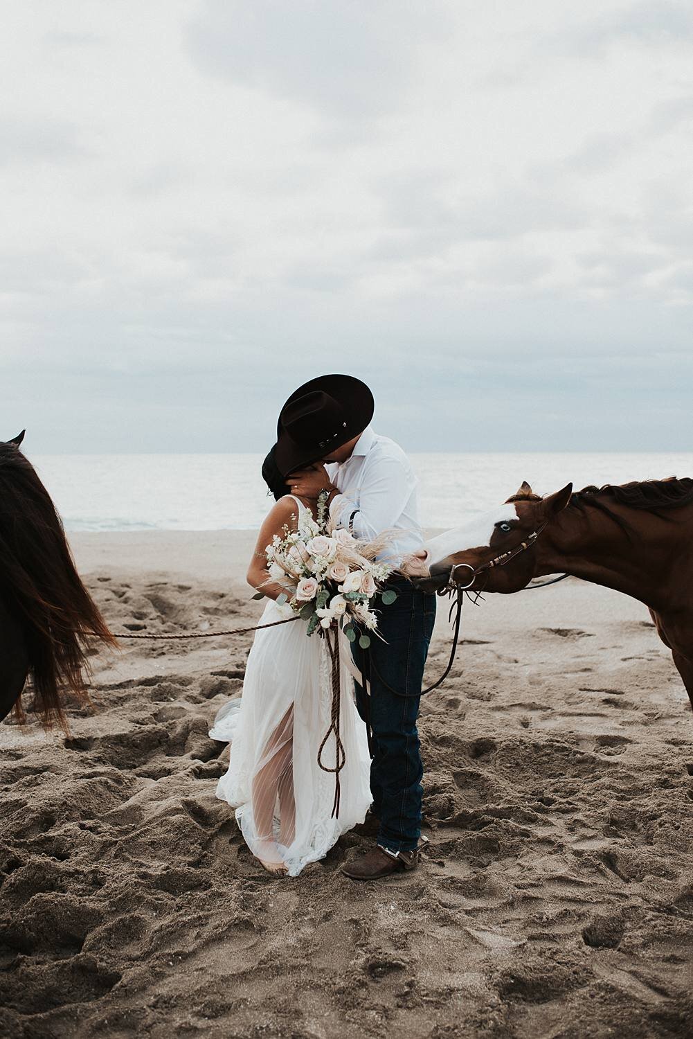 Florida beach ceremony with horses captured by Florida Elopement Photographer, Anna Holden Photo