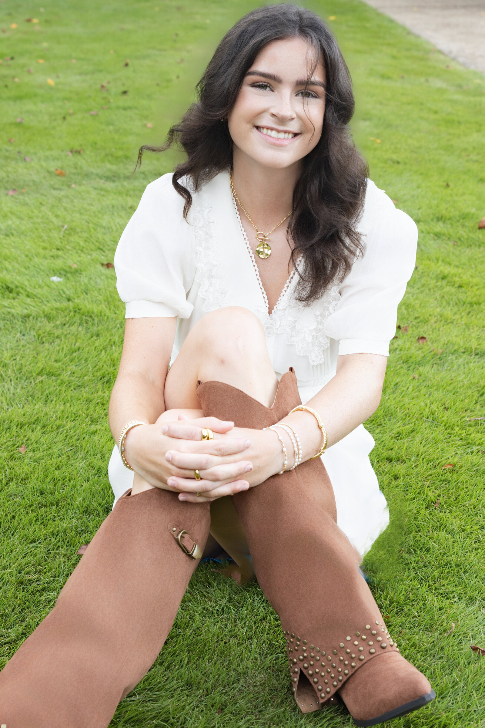 High School Senior in Atlanta at Morgan Falls in Fall dress and tall boots