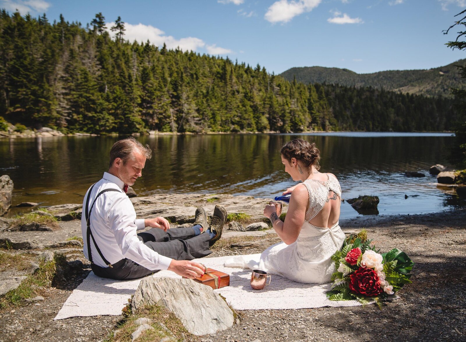elopement couple picnics at mountain lake in Vermont
