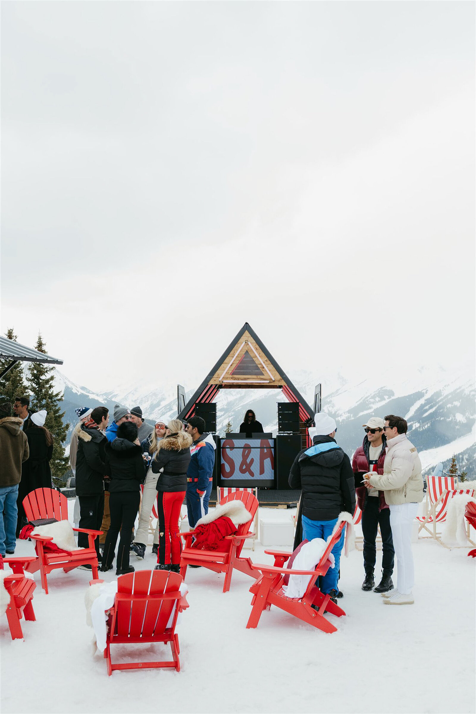 Stylish bride and groom at multi-day Aspen wedding with upscale decor and alpine scenery