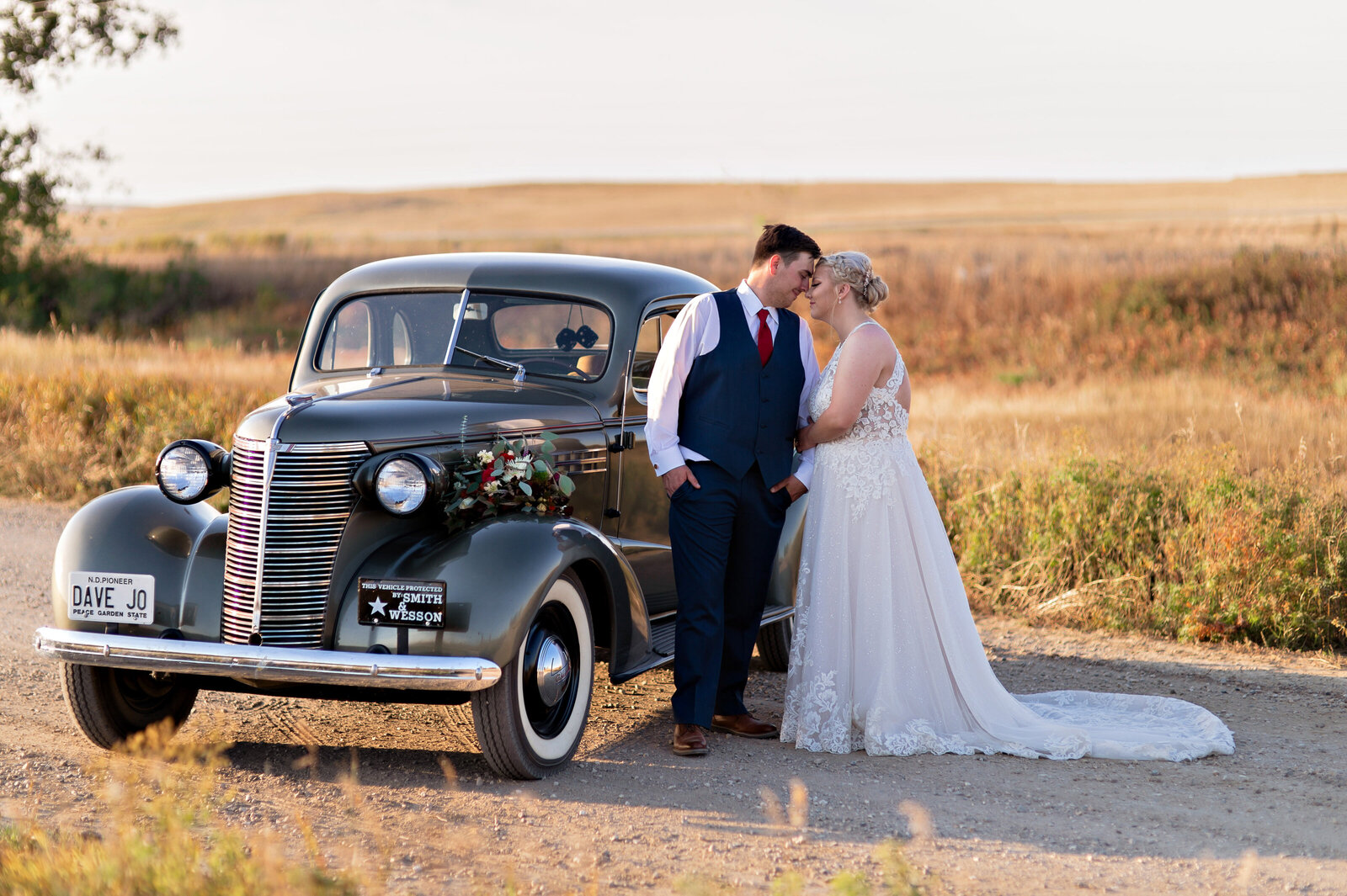 bride groom classic car sunset dirt road manhattan kansas wedding photographer-3