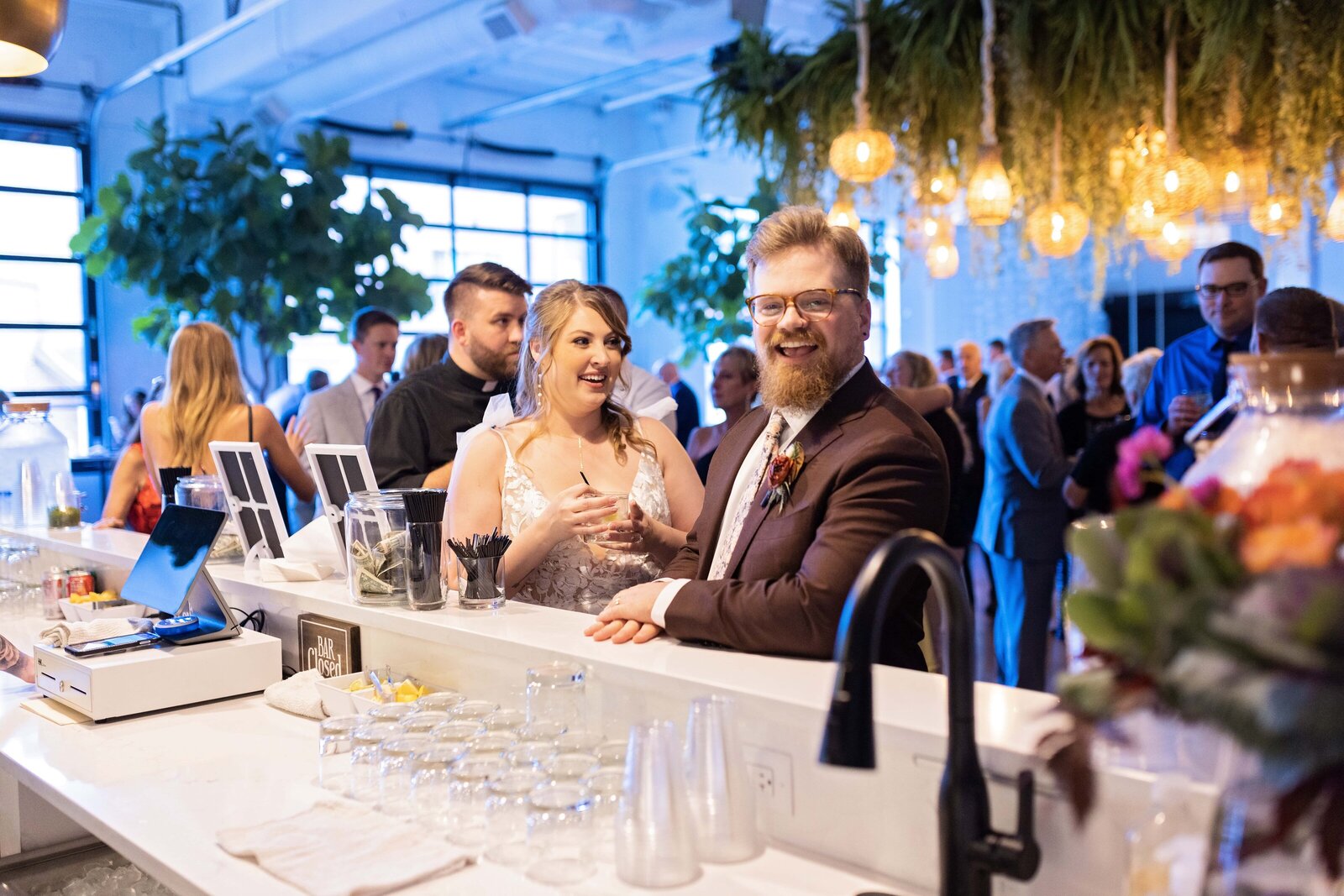 bride-groom-cocktail-hour-bar-liquid-motion