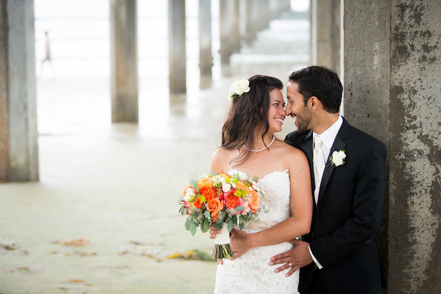 scripps pier with bride and groom