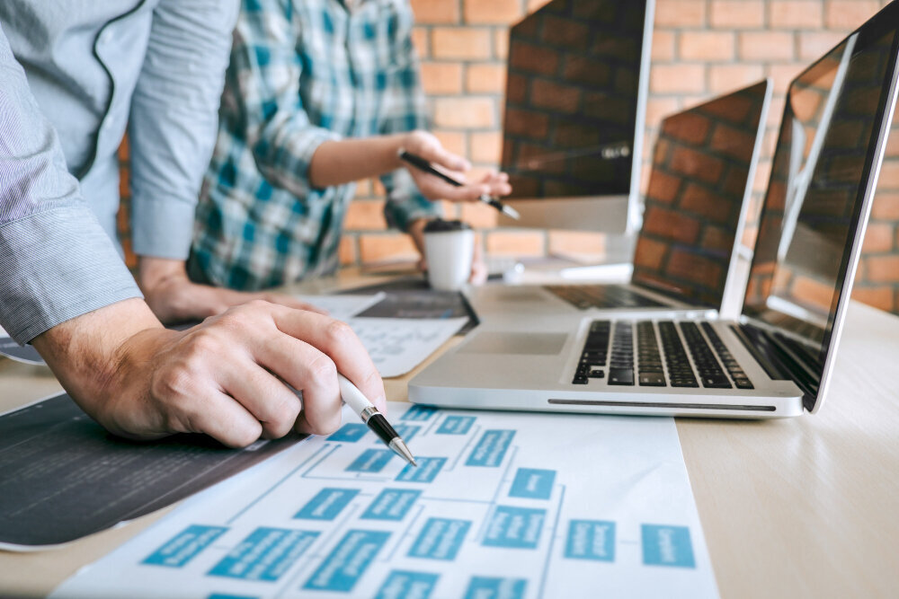 team-professional-developer-programmer-cooperation-meeting-brainstorming-programming-website-working-software-coding-technology-writing-codes-database