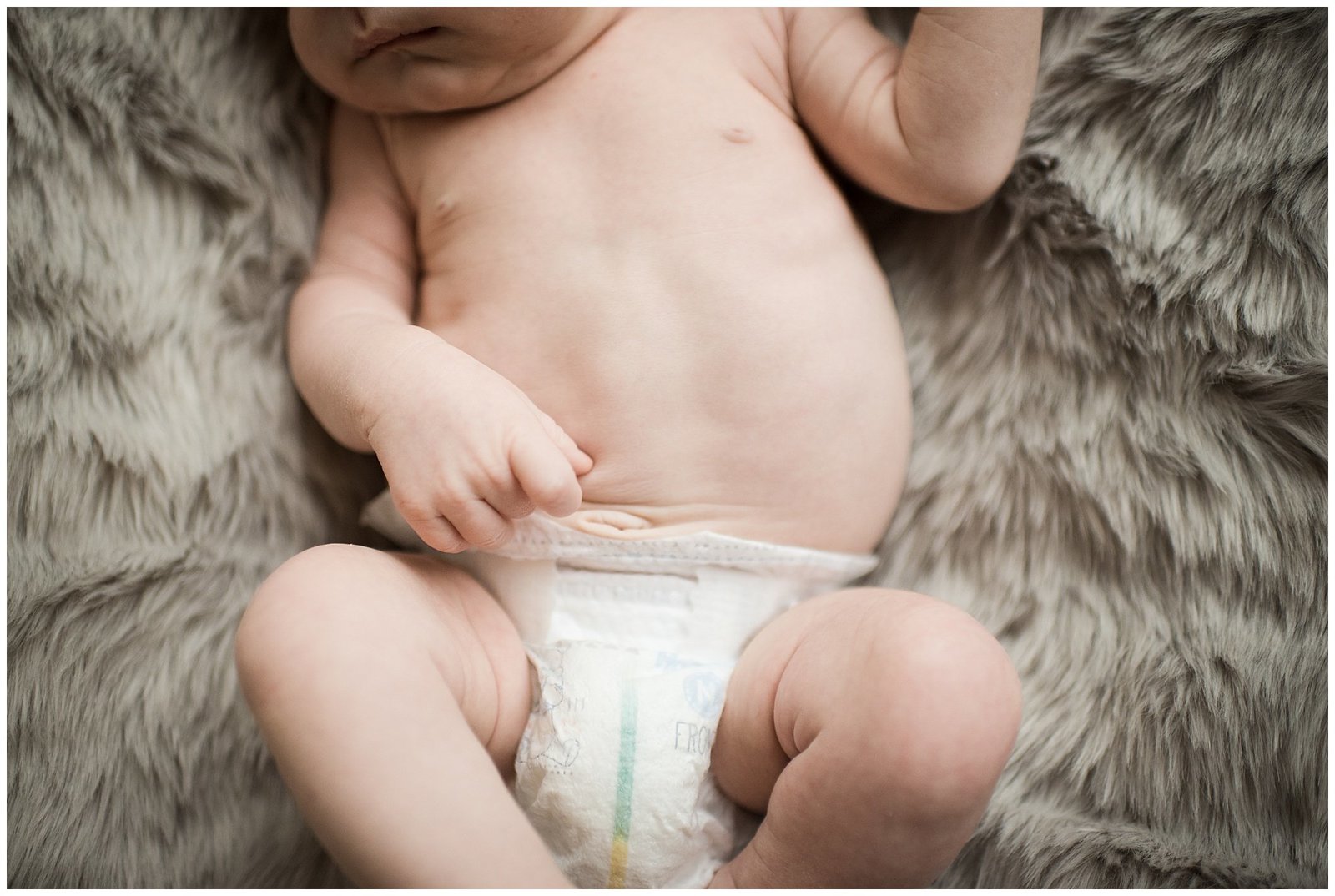 close up of baby boy tummy in home lifestyle newborn photoshoot Emily Ann Photography Seattle Photographer