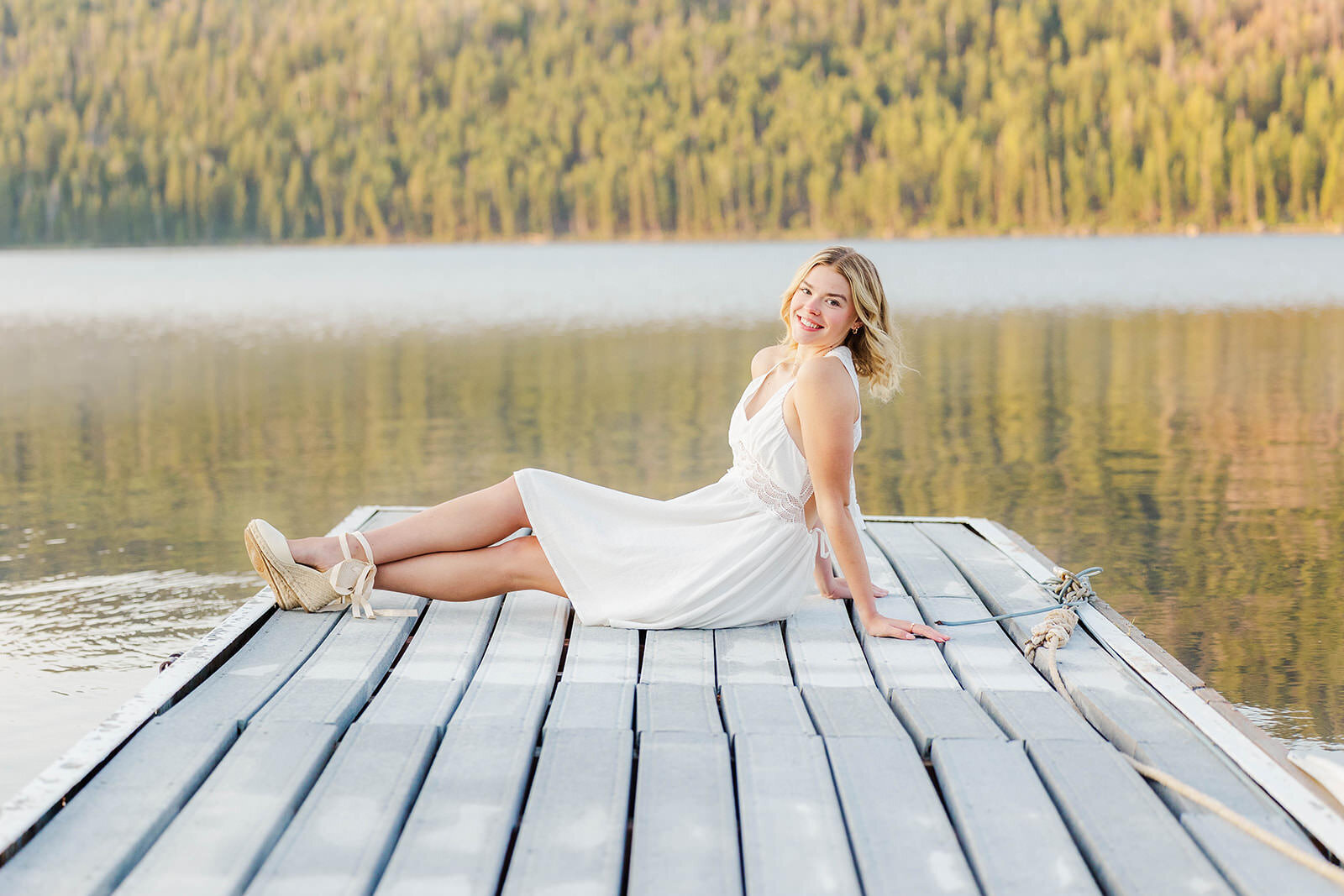Girl posing for her high school senior photos near Pinedale, Wyoming.