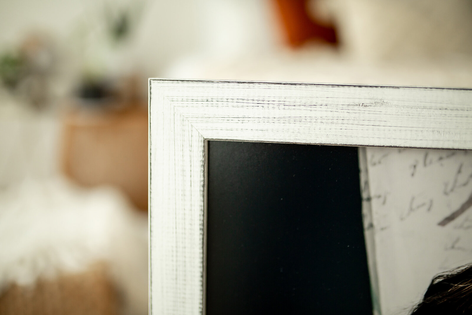 close up of white rustic picture frame