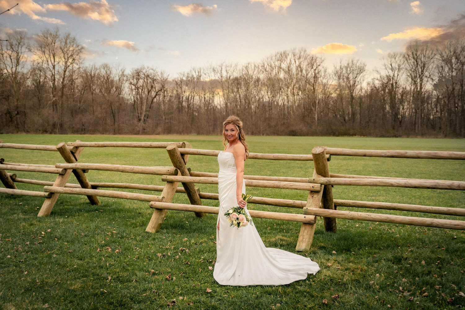 Bride walking at the greenfield venue