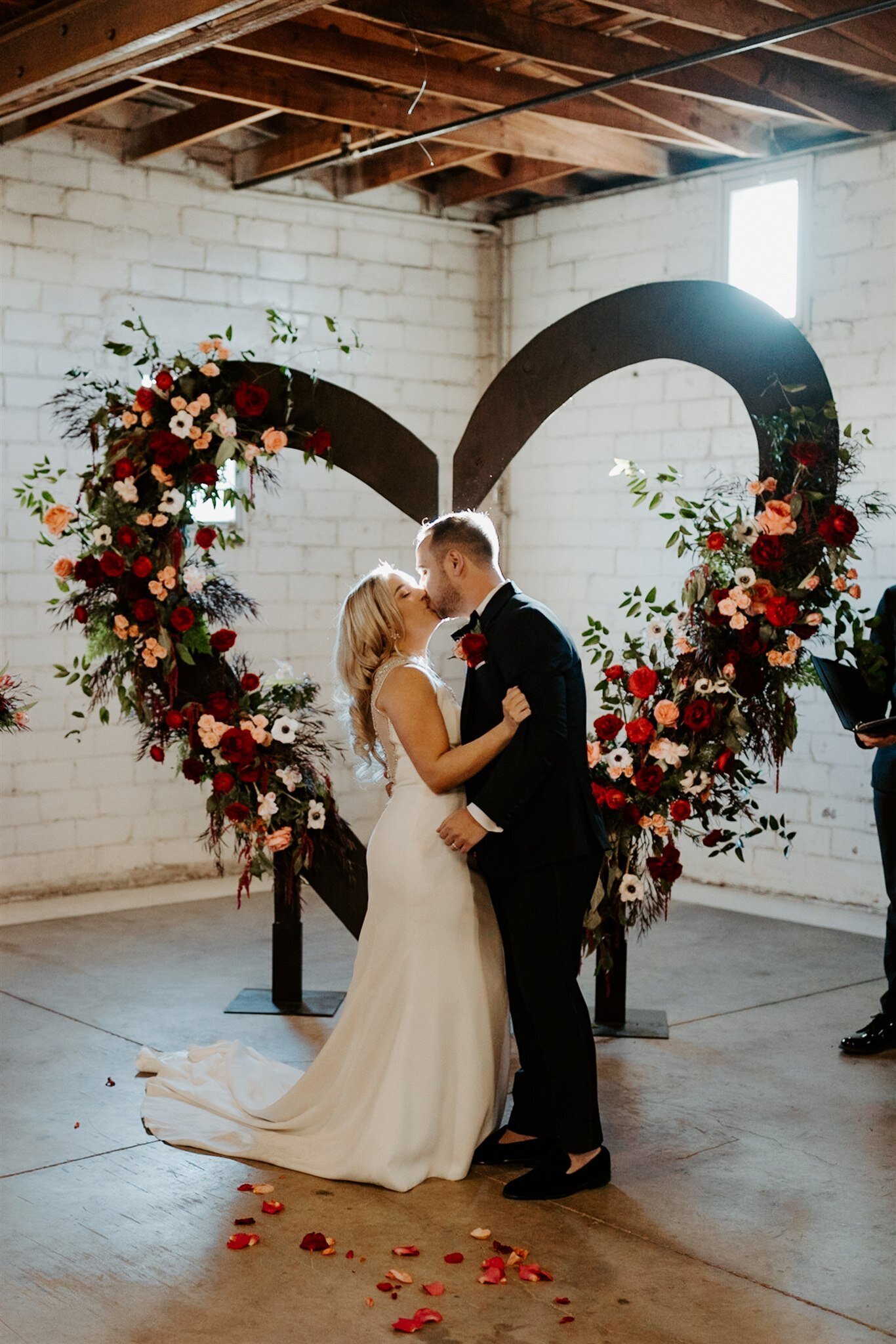 A lush, heart shaped ceremony installation for a stunning valentines themed wedding in dallas texas.