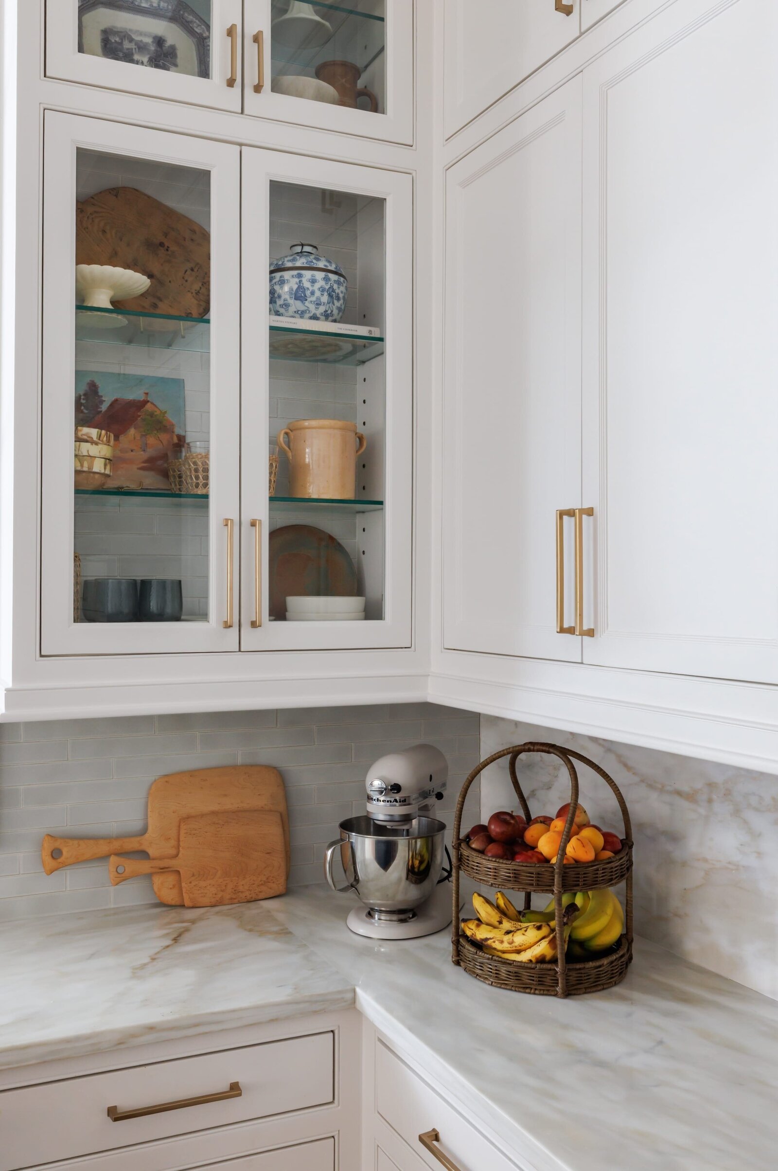 vision and hammer styled shelves with glass doors in kitchen