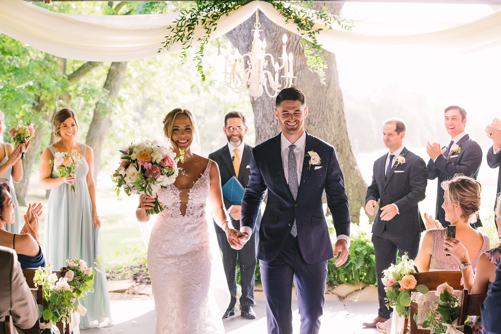 bride-groom-walking-ceremony-aisle