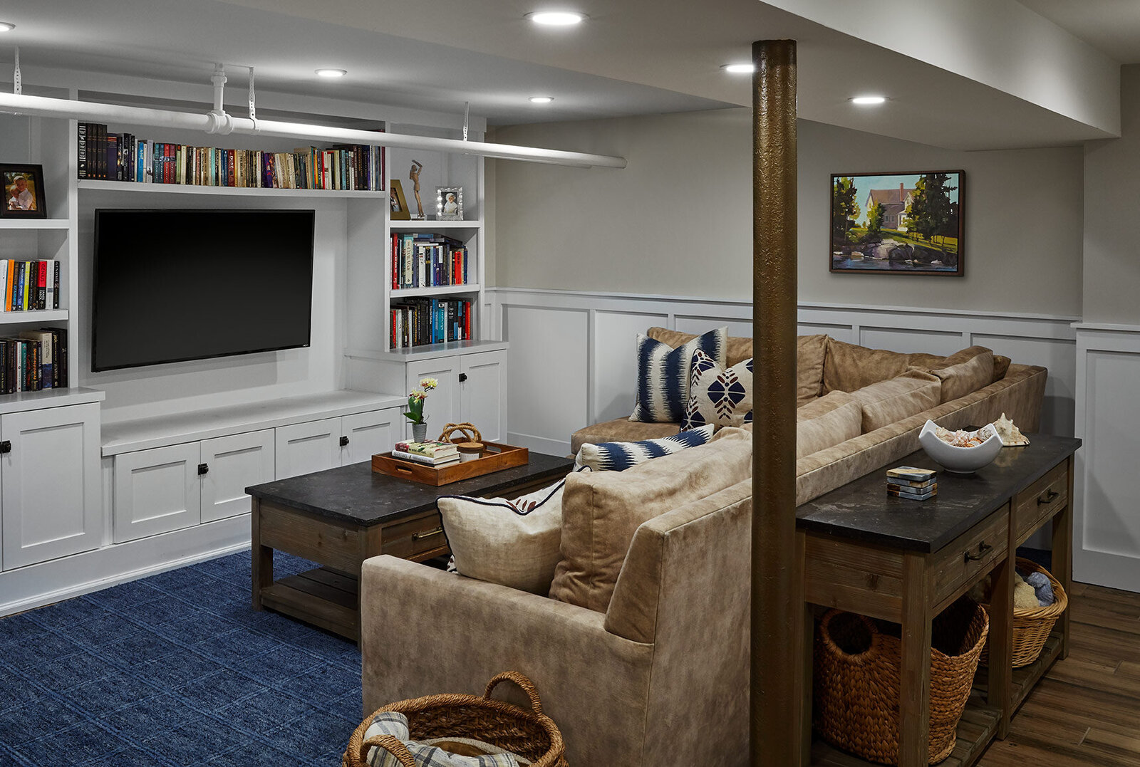 Basement home movie theater with built in shelves