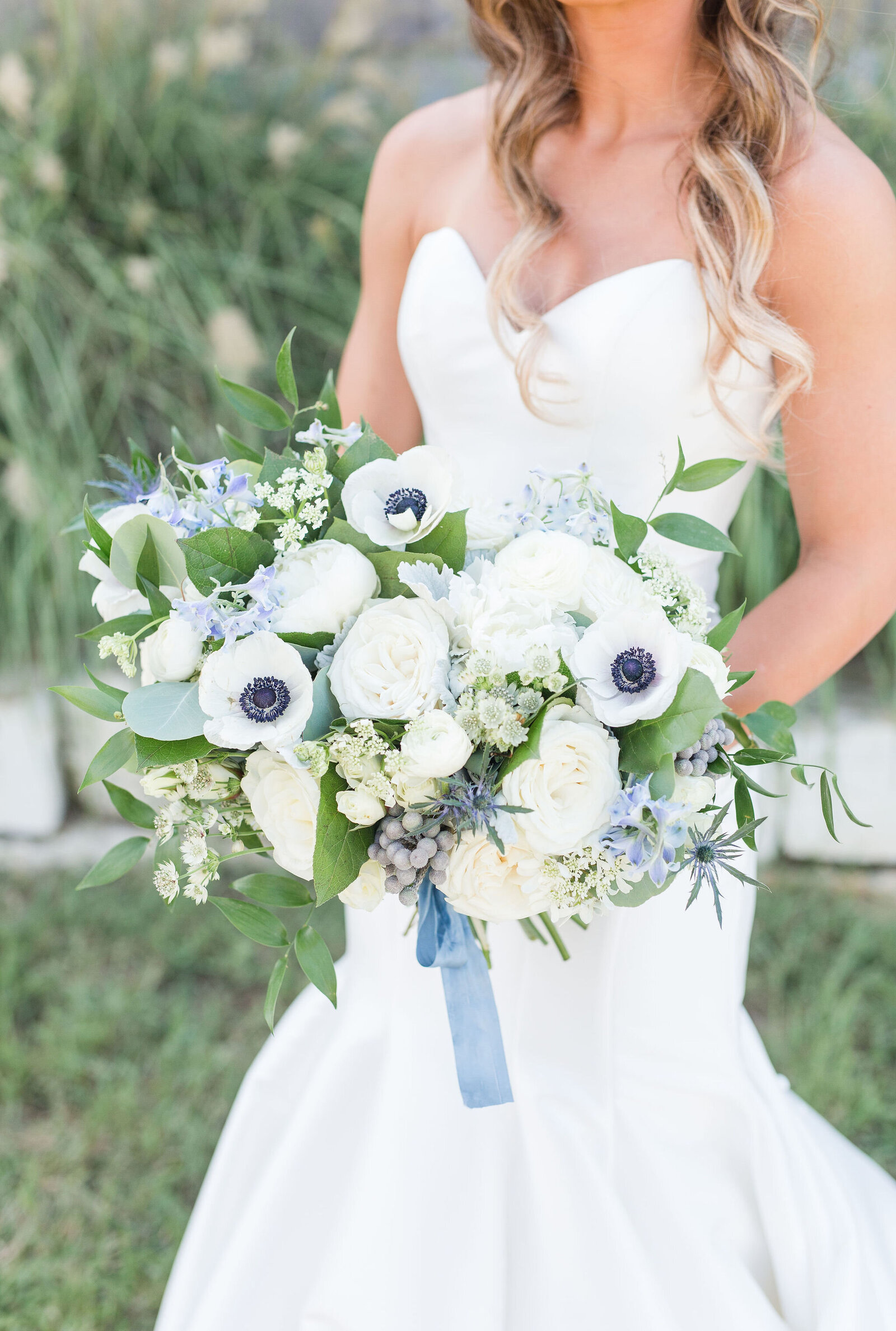white and blue bridal bouquet