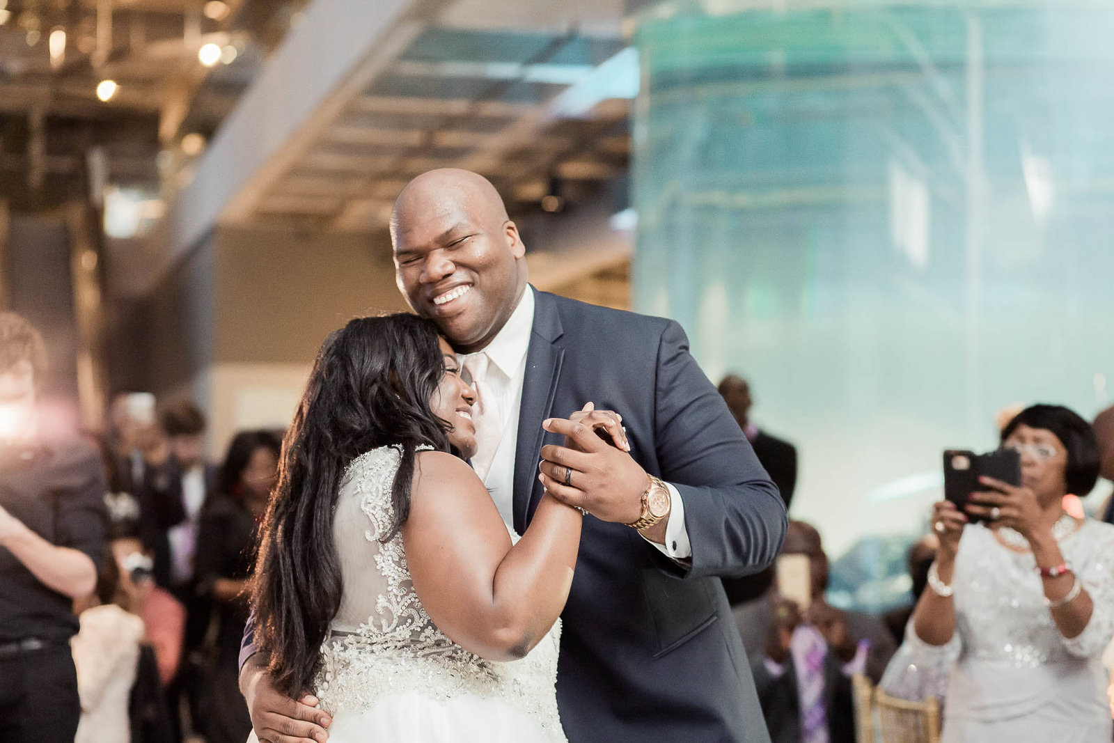 Bride and groom have their first dance, South Carolina Aquarium, Charleston, South Carolina