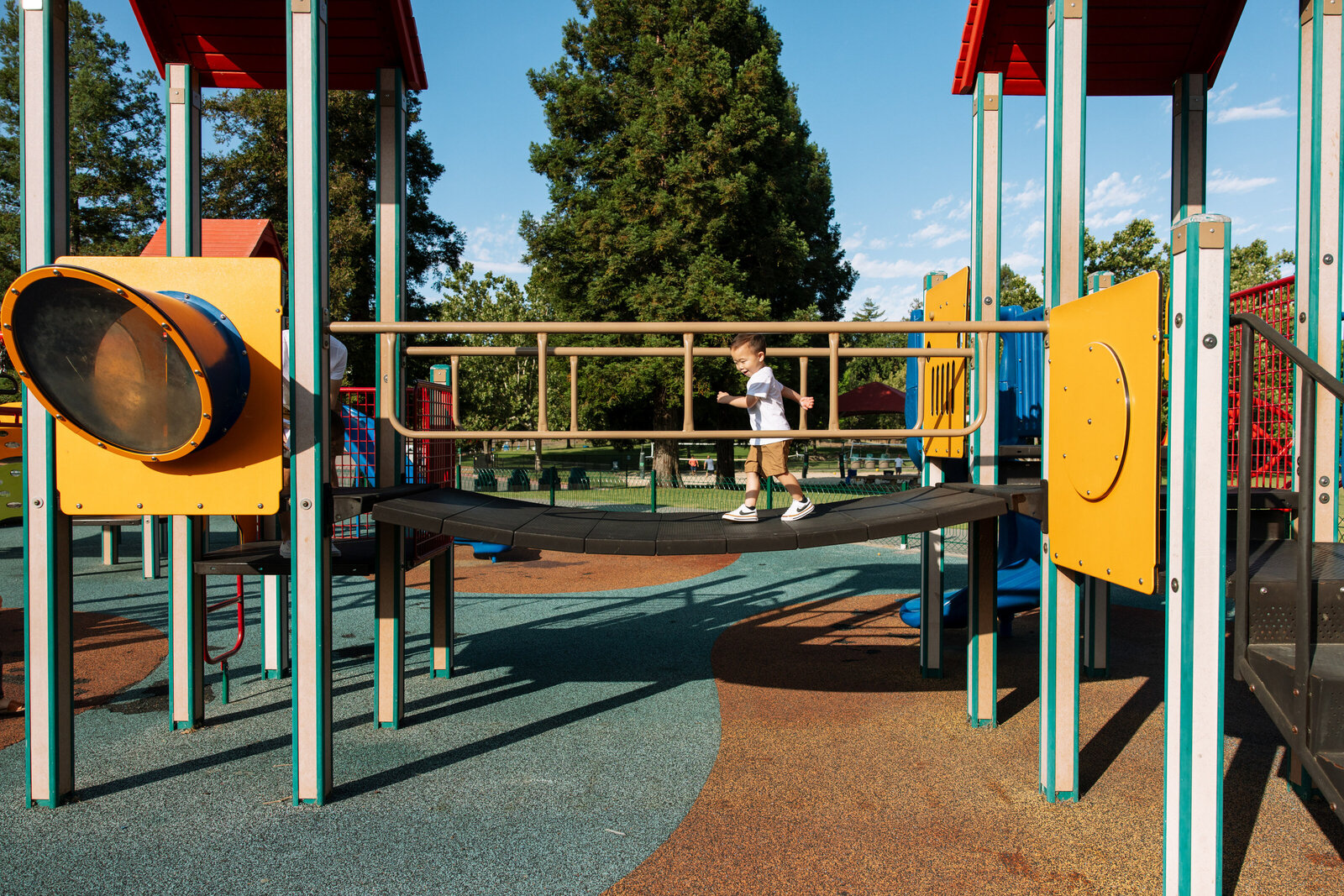 family documentary photos at playground